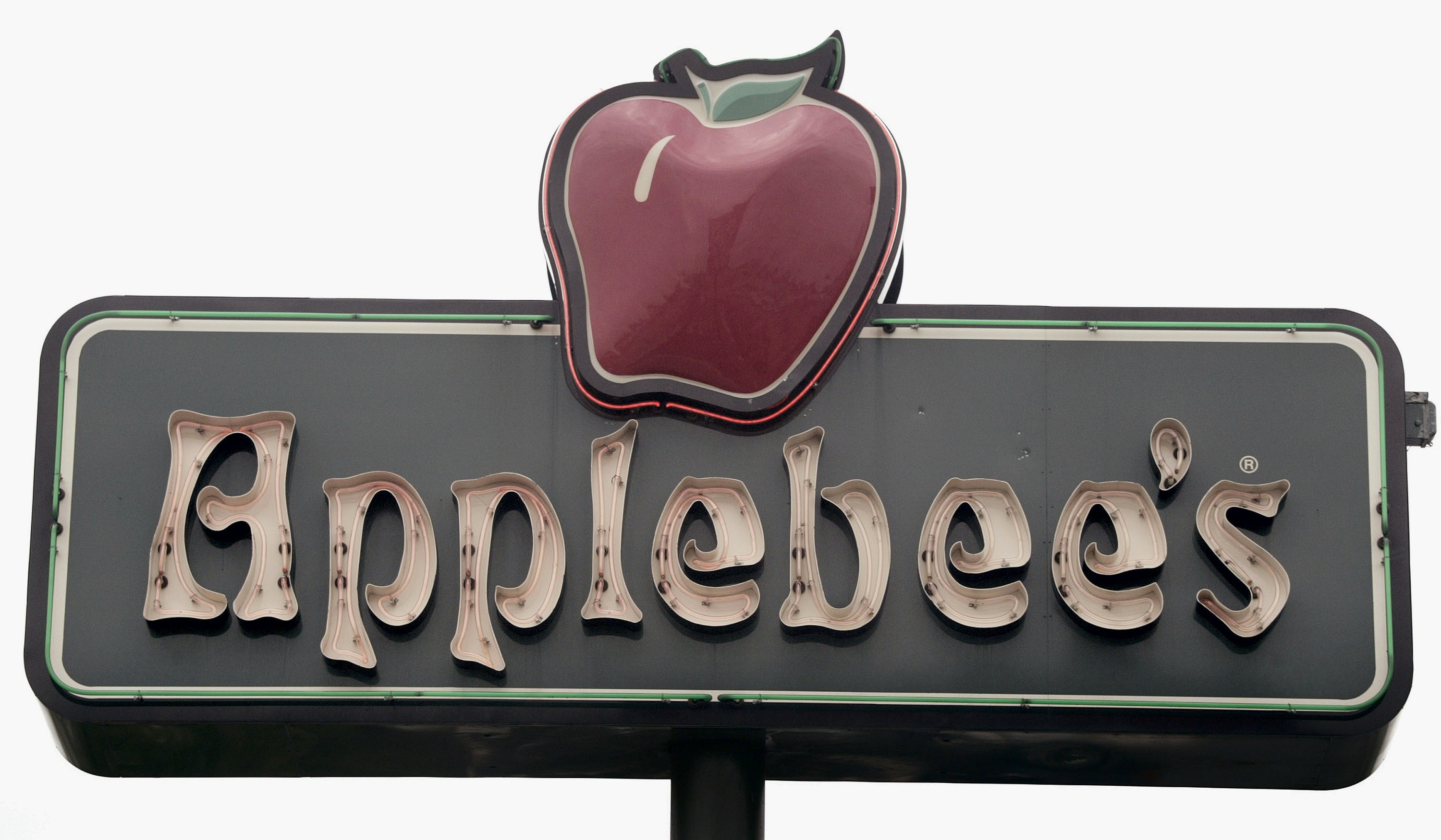 A sign marks the location of an Applebee